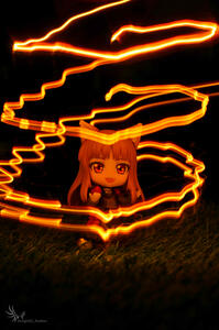 Holo (spice and wolf) holding an apple at night with orange light "painted" around her