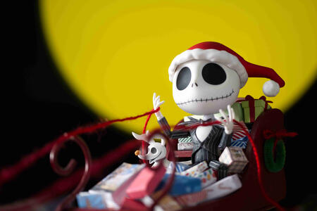 Jack skellington bringing presents in a sleigh